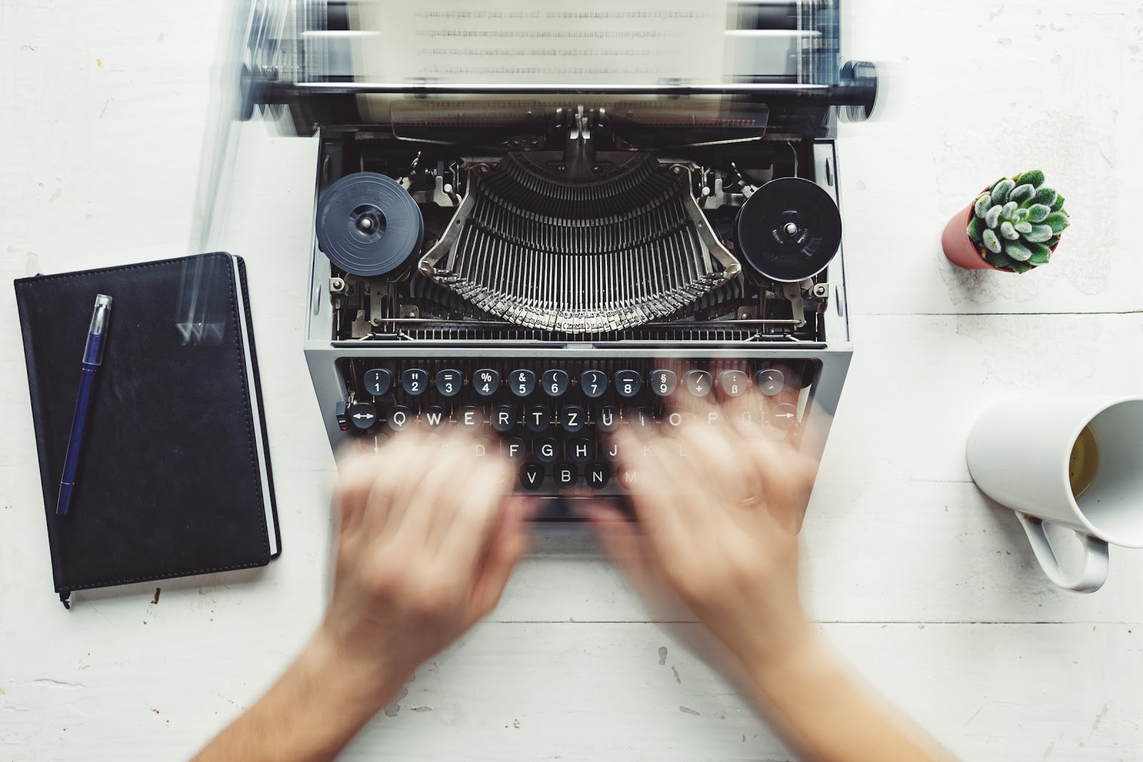 copywriter typing on a cool typewriter